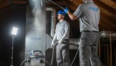 Technician performing air duct cleaning service in Washington, DC for Five Star Cooling